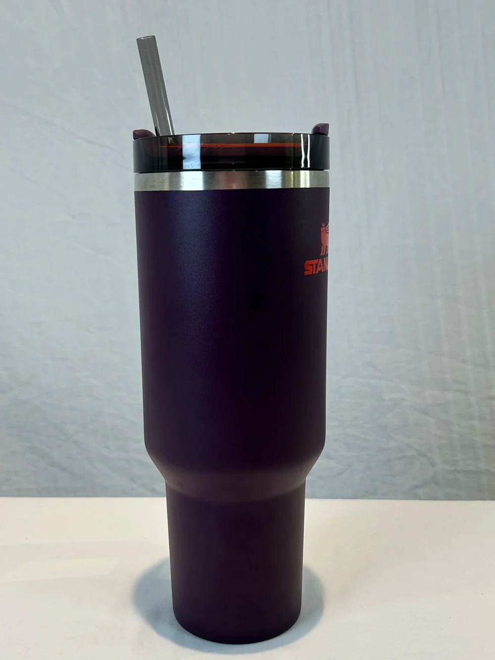 Stanley Plum Purple 40 oz Quencher
H2.0 FlowState Tumbler Mug w Orange logo - Picture 14 of 15